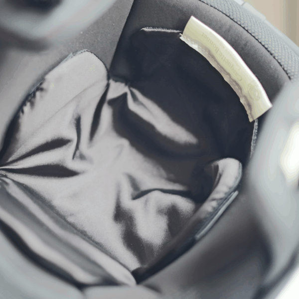 Black satin helmet liner inside helmet